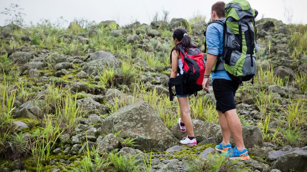 Monsoon Magic In Igatpuri: A Fun-Filled Family Weekend Family Embarking On A Monsoon Trek In Igatpuri Wearing Raincoats And Exploring A Vibrant Green Trail